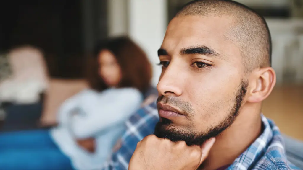 Thoughtful man reflecting in a relationship setting, illustrating personal agency and positive change through counselling